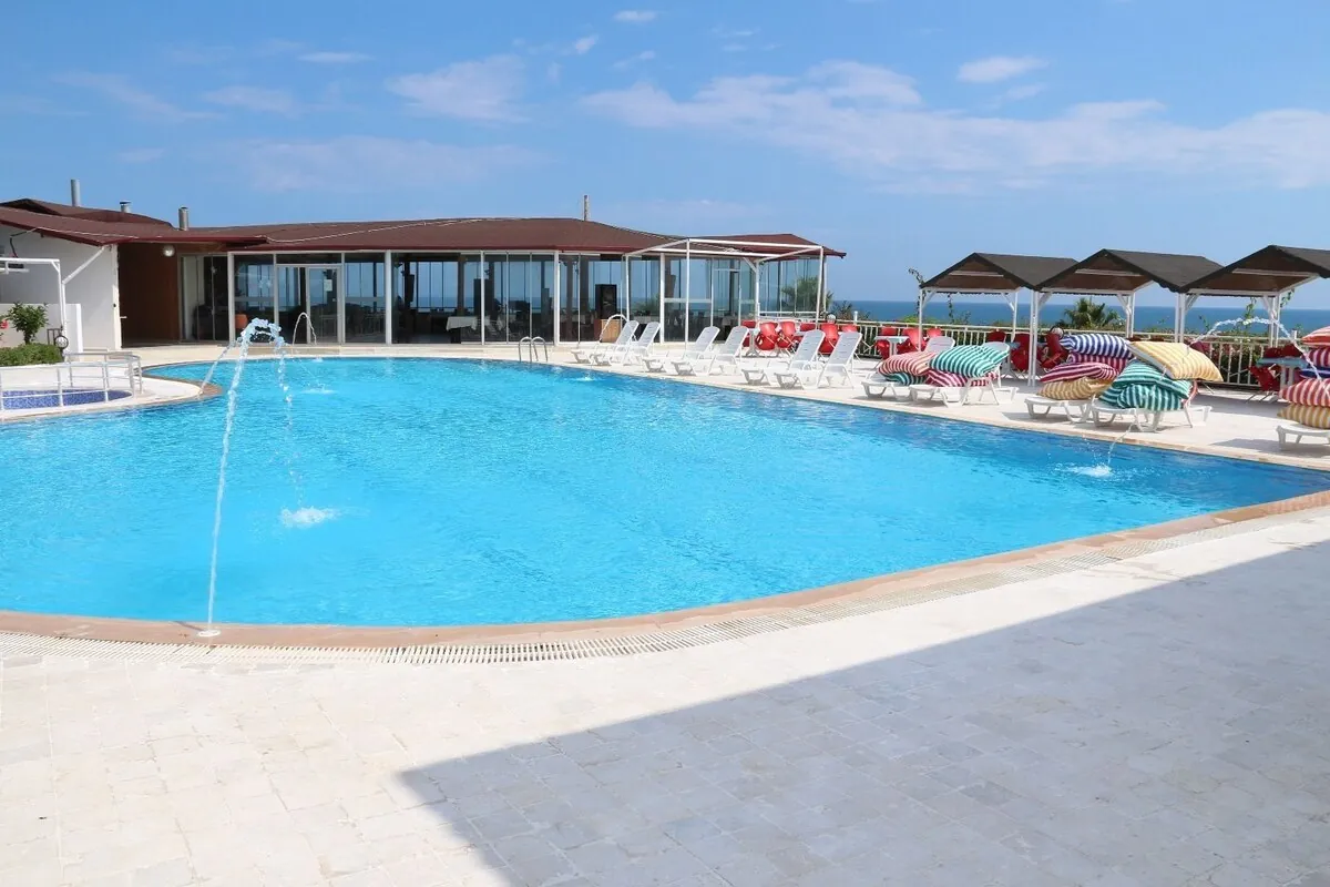 Outdoor swimming pool with sea view