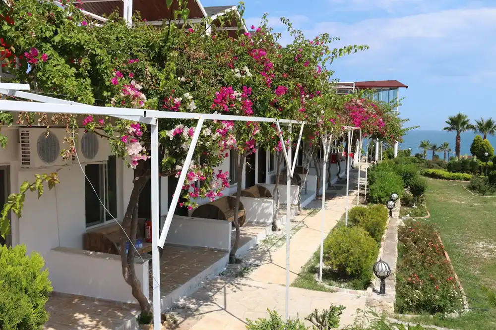 Rooms with terraces and flowering bougainvillea